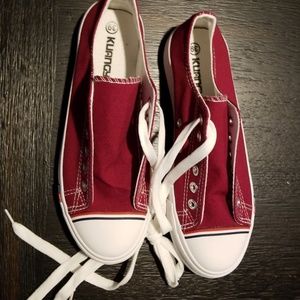 Tennis shoes in the "converse" style.